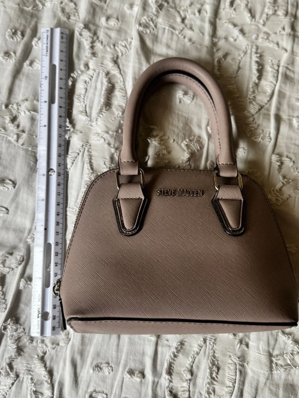 Steve Madden compact dome